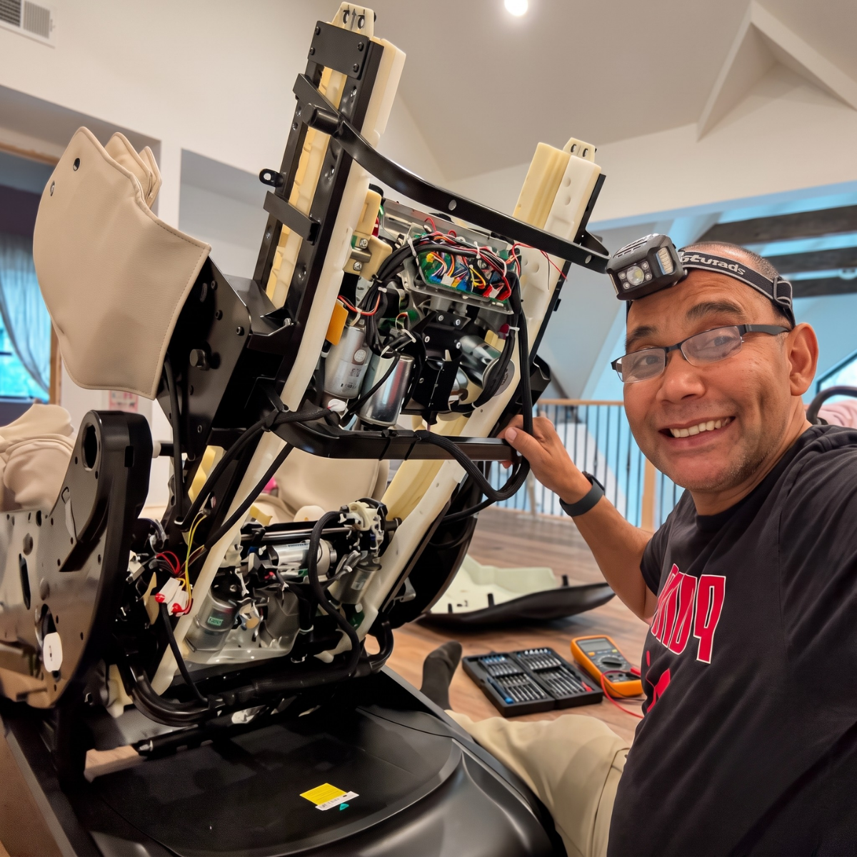 Professional technician inspecting a massage chair in the New Jersey and New York region