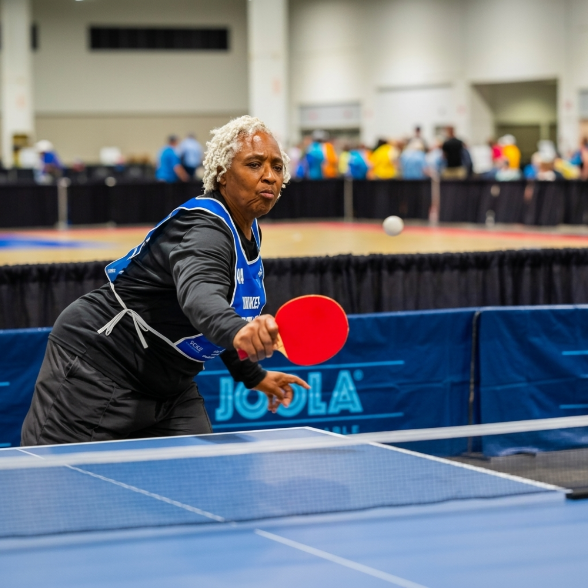 Veterans, volunteers, and guests inside the Athlete Village during the 2026 National Veterans Golden Age Games.