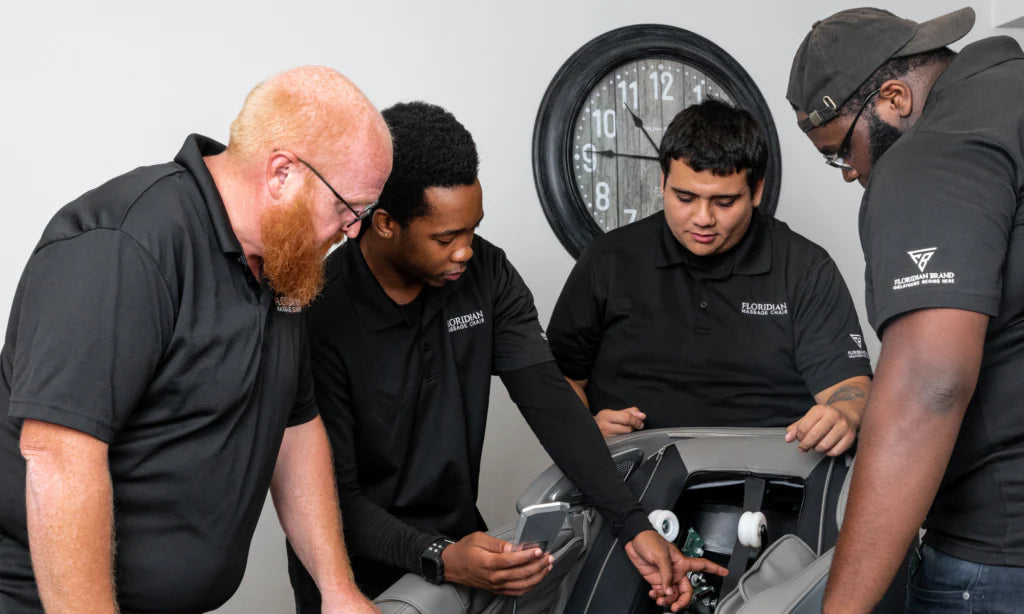 service people doing massage chair training.