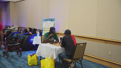 Guests Enjoying A Floridian Brand Massage Chair Rental Experience At A Professional Event